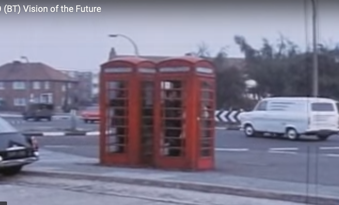 BT Vision of Future -- Picture of street with 3 English Red Phone booths.