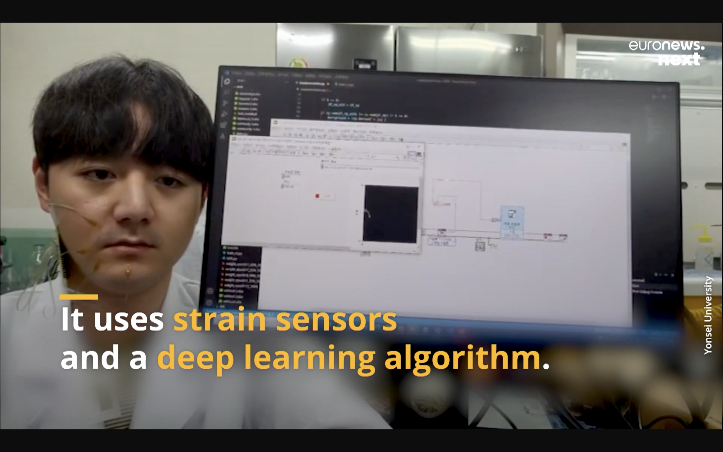 Researcher from Yonsei University explaining the speech recognition sensor.